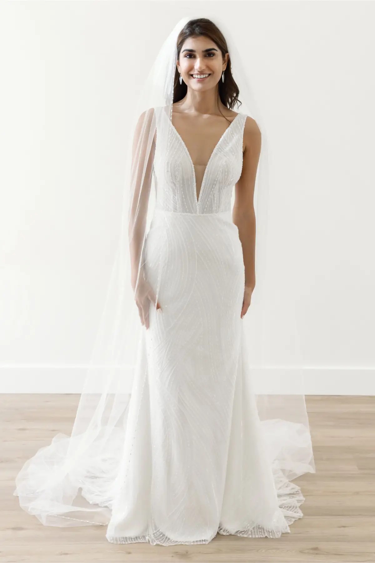Model wearing Foster WToo wedding dress