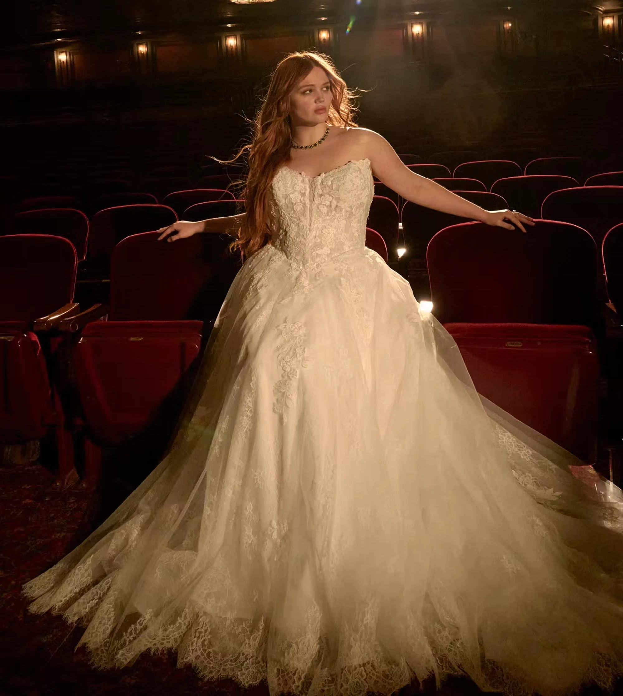 Model wearing a plus size gown