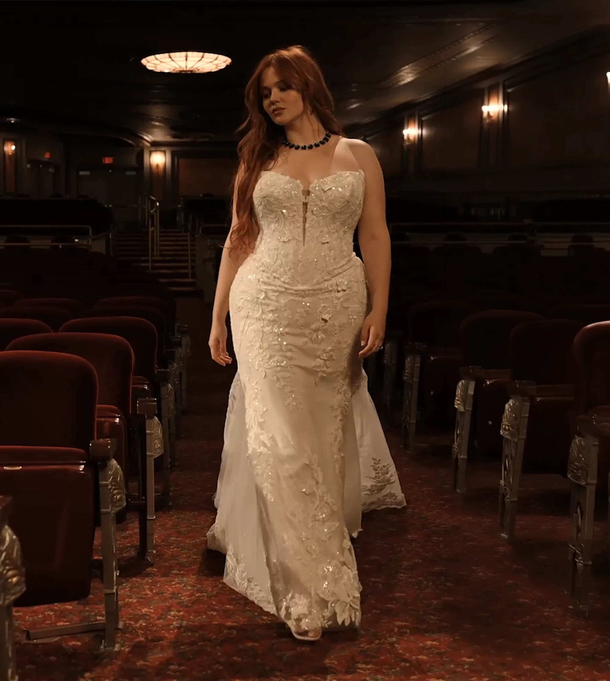 Model wearing a plus size gown