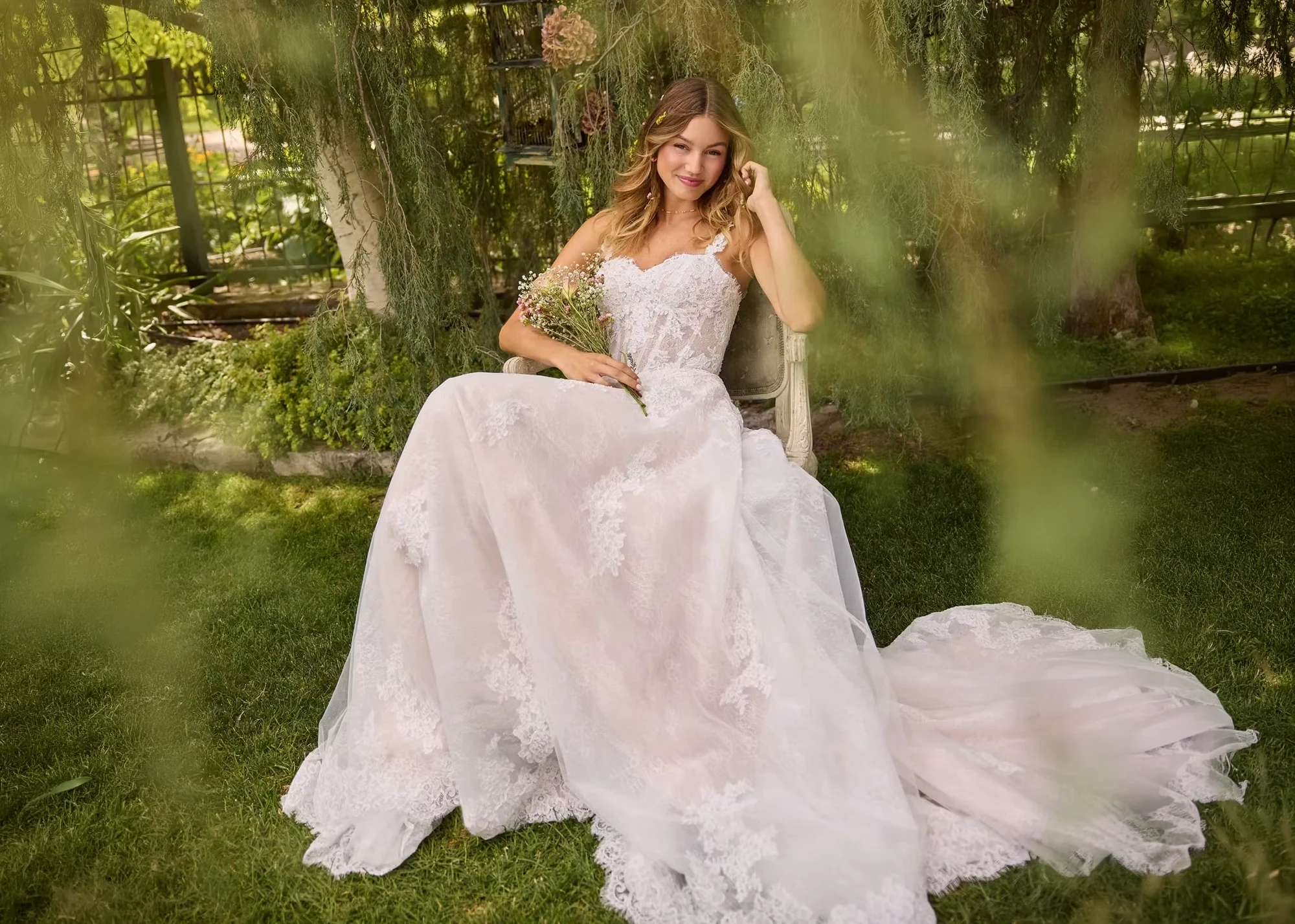 Model wearing a gown by Rebecca Ingram