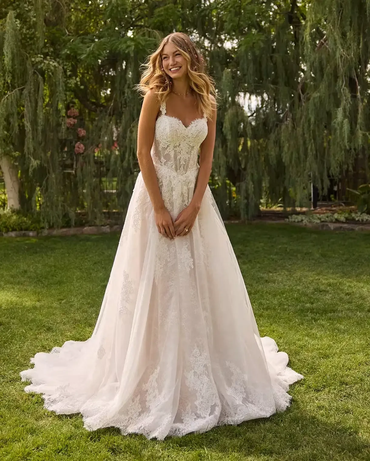 Model wearing a Rebecca Ingram gown