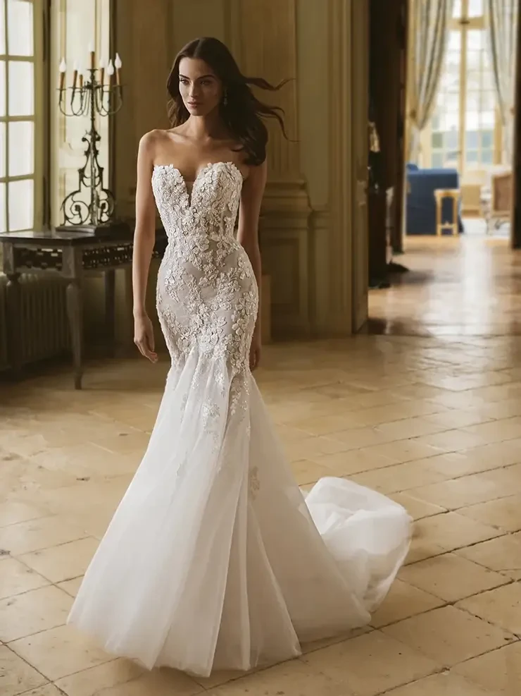 Model wearing a Élysée gown