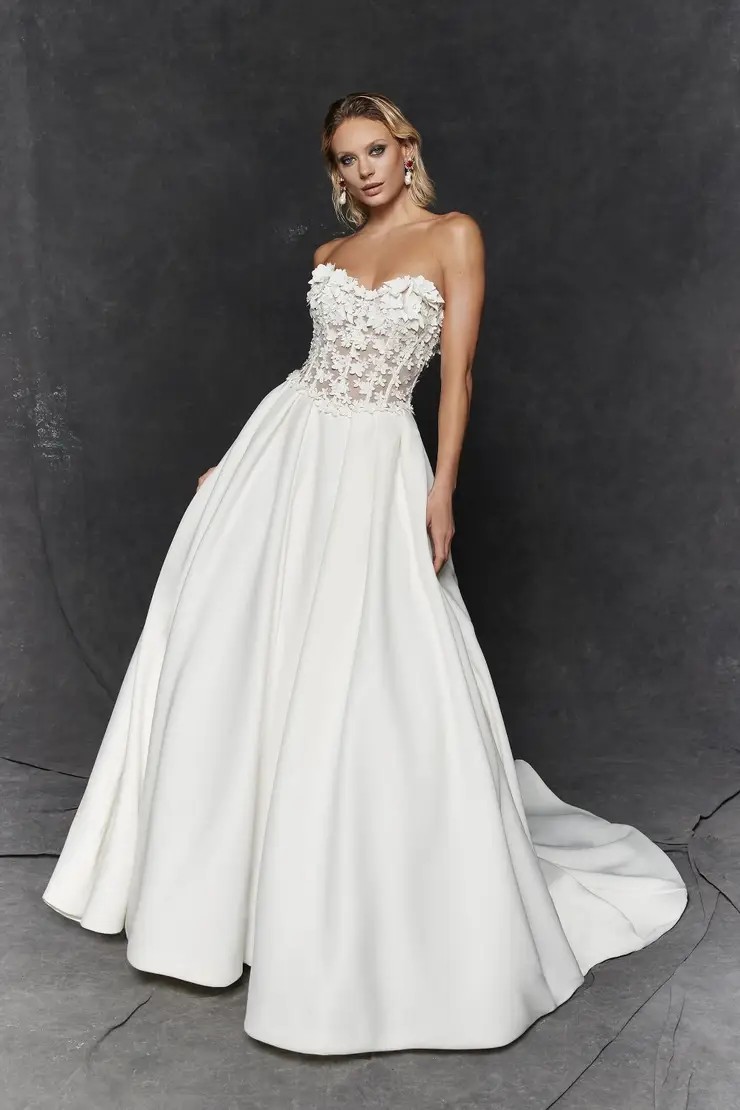 Model wearing a Justin Alexander Signature gown