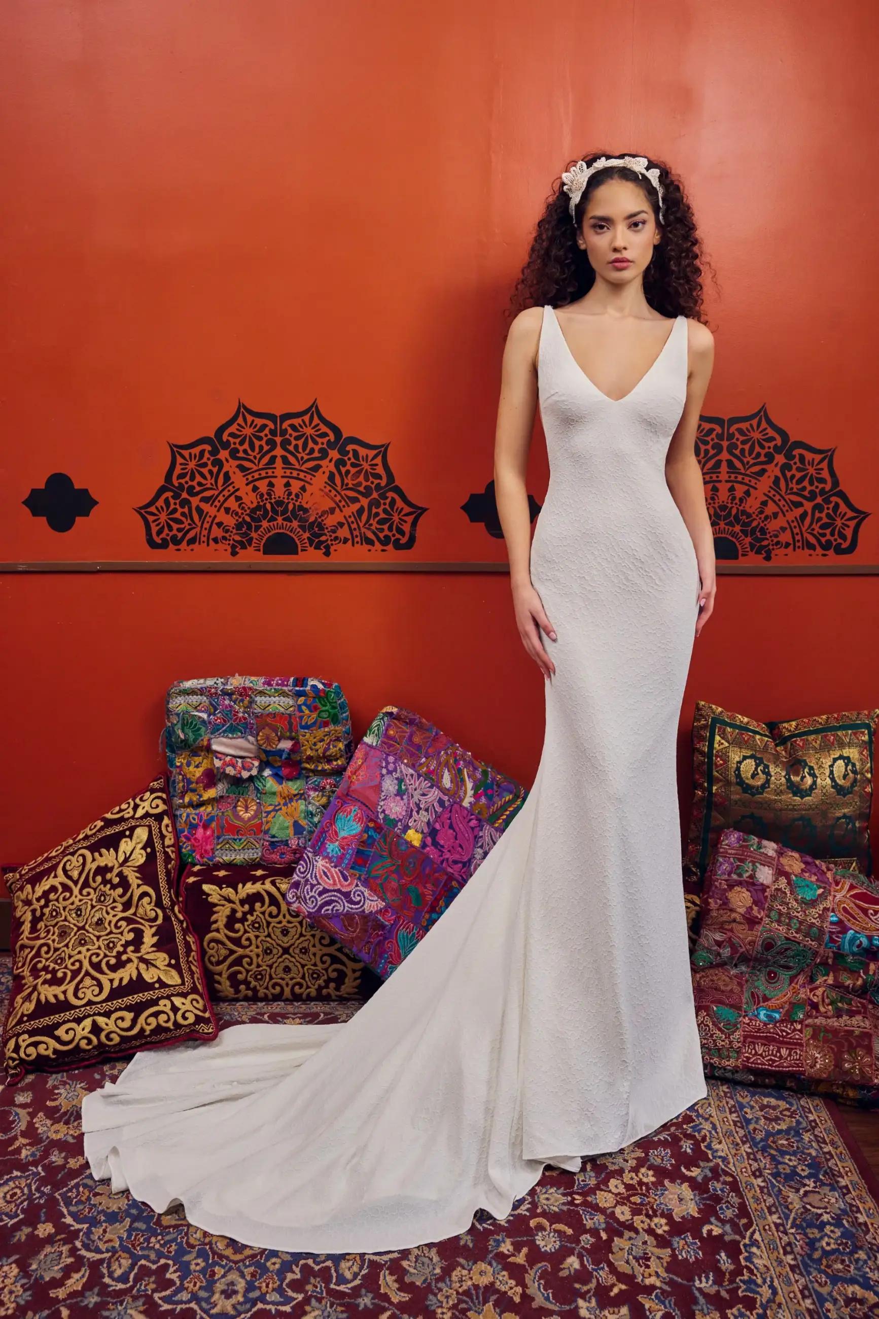 Model wearing a La Perle by Calla Blanche gown