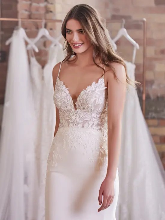 Model wearing a Rebecca Ingram gown