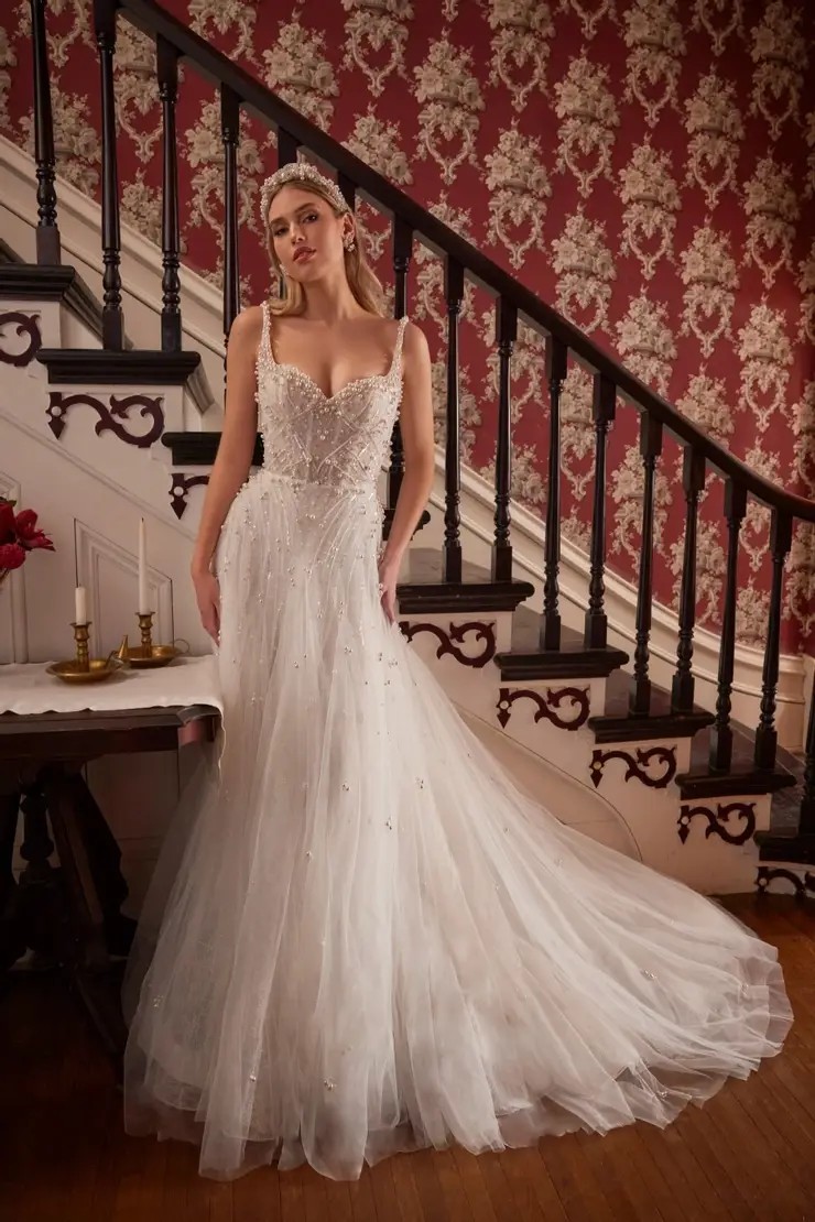 Model wearing a L'Amour by Calla Blanche gown