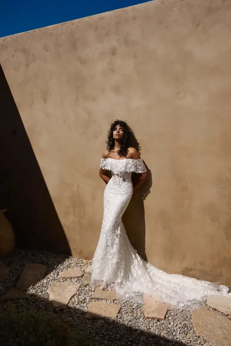 Model wearing a Lillian West gown