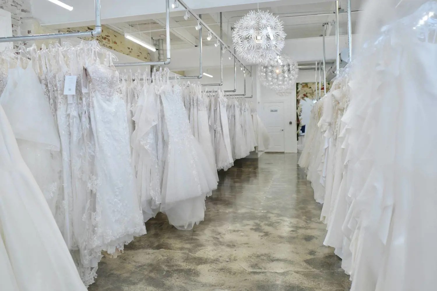 Rack of wedding dresses at Liliana Bridal House