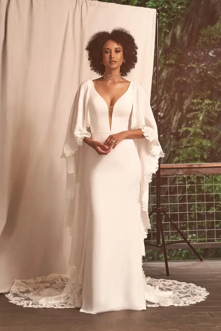 Model wearing a Lillian West gown