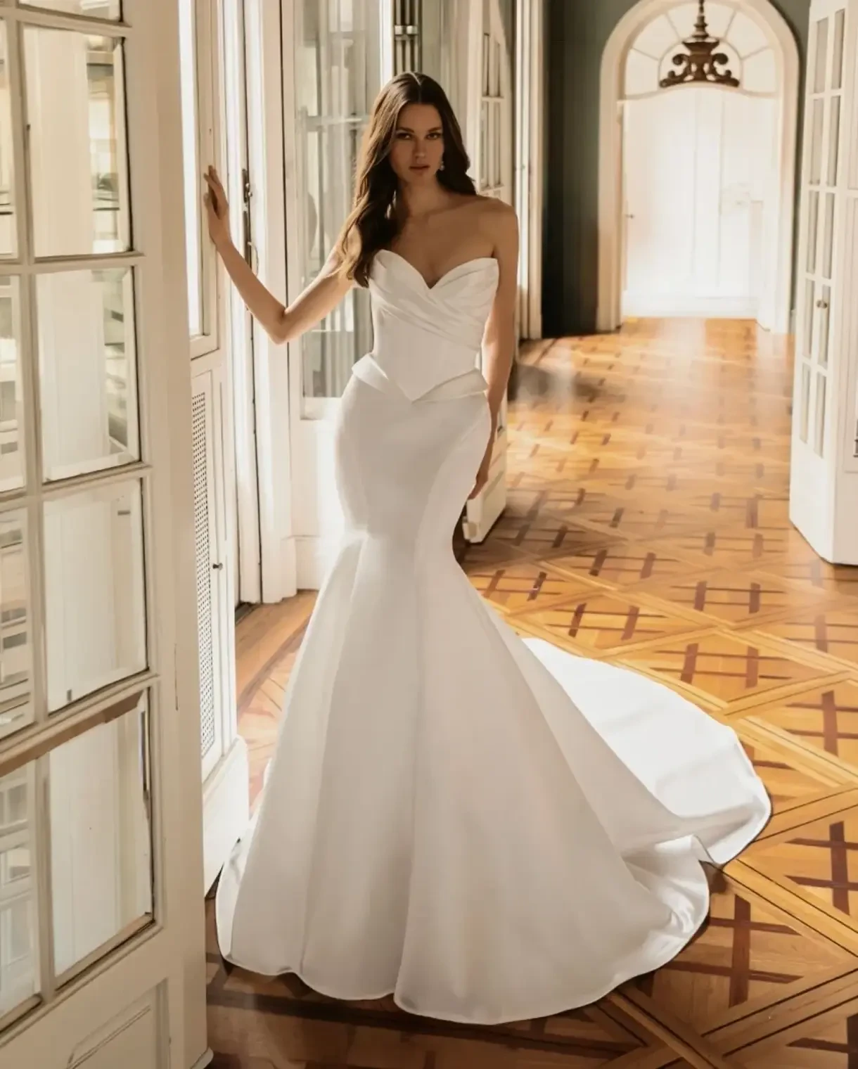Model wearing a Élysée gown