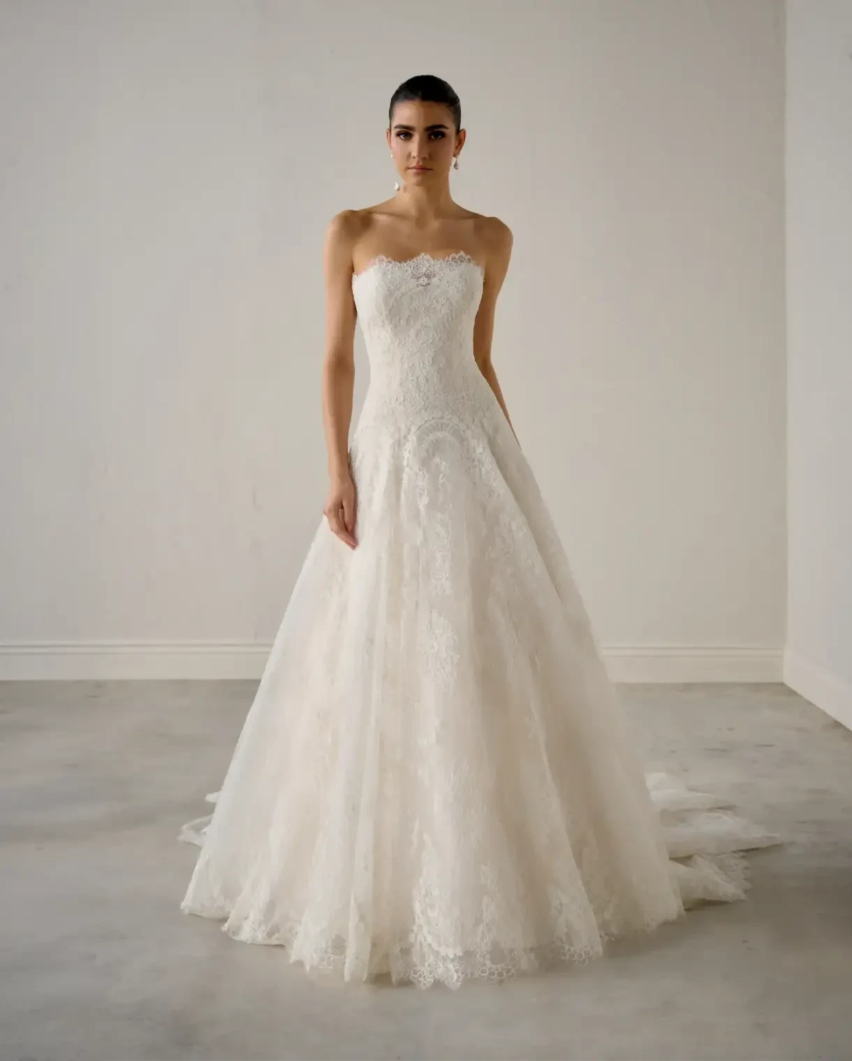 Model wearing a Justin Alexander Signature gown