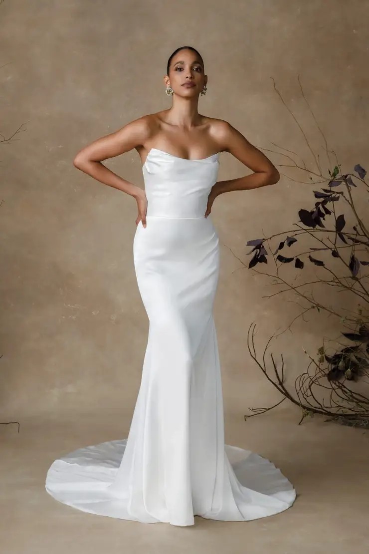 Model wearing a Justin Alexander gown