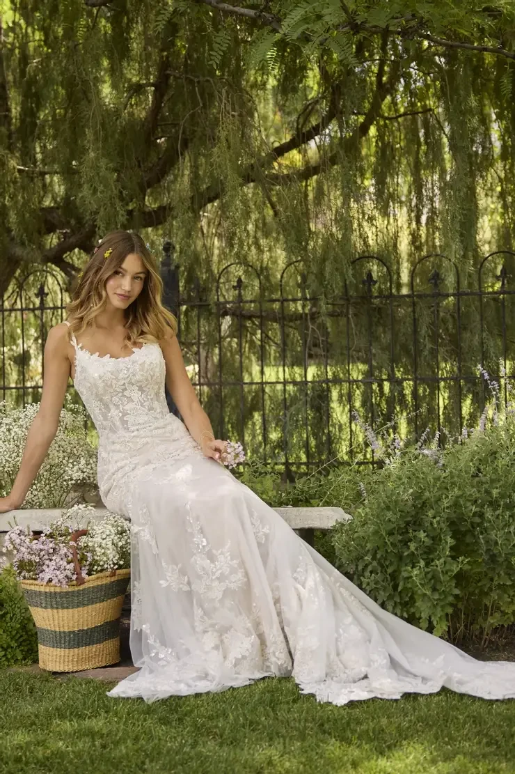 Model wearing a Rebecca Ingram gown