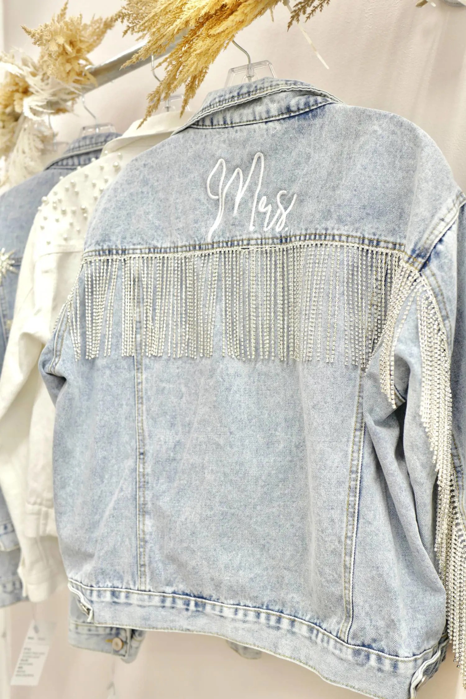 Custom 'mrs' denim jacket at Liliana Bridal House